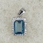 Sterling silver pendant with blue topaz