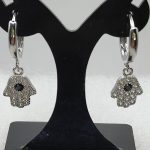 Sterling silver huggies with Hand of Fatima