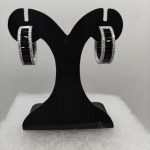 Sterling silver hoop earrings with black baguette cubics and white cz detail