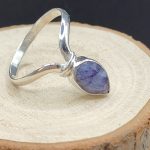 Fancy design sterling silver ring with sapphire