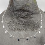 Sterling silver necklace with dangly round discs