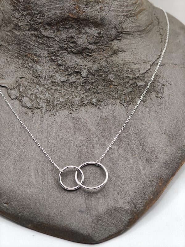 Sterling silver necklace with small circle in bigger circle
