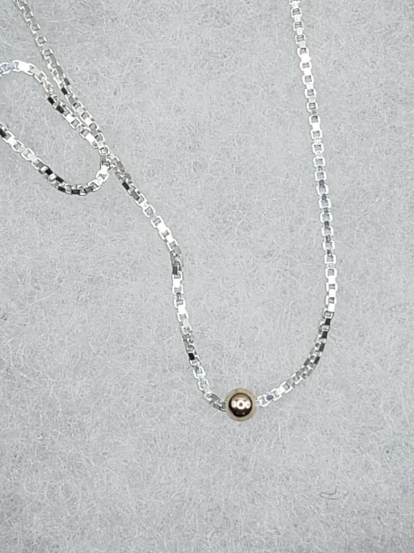 Sterling silver necklace with 3mm 9 carat gold 'mustard seed'