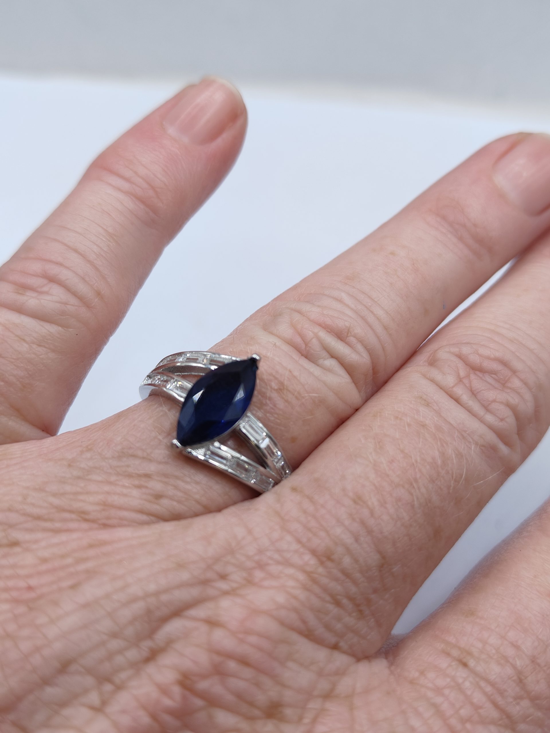 Size 7 sterling silver ring with marquis blue cz