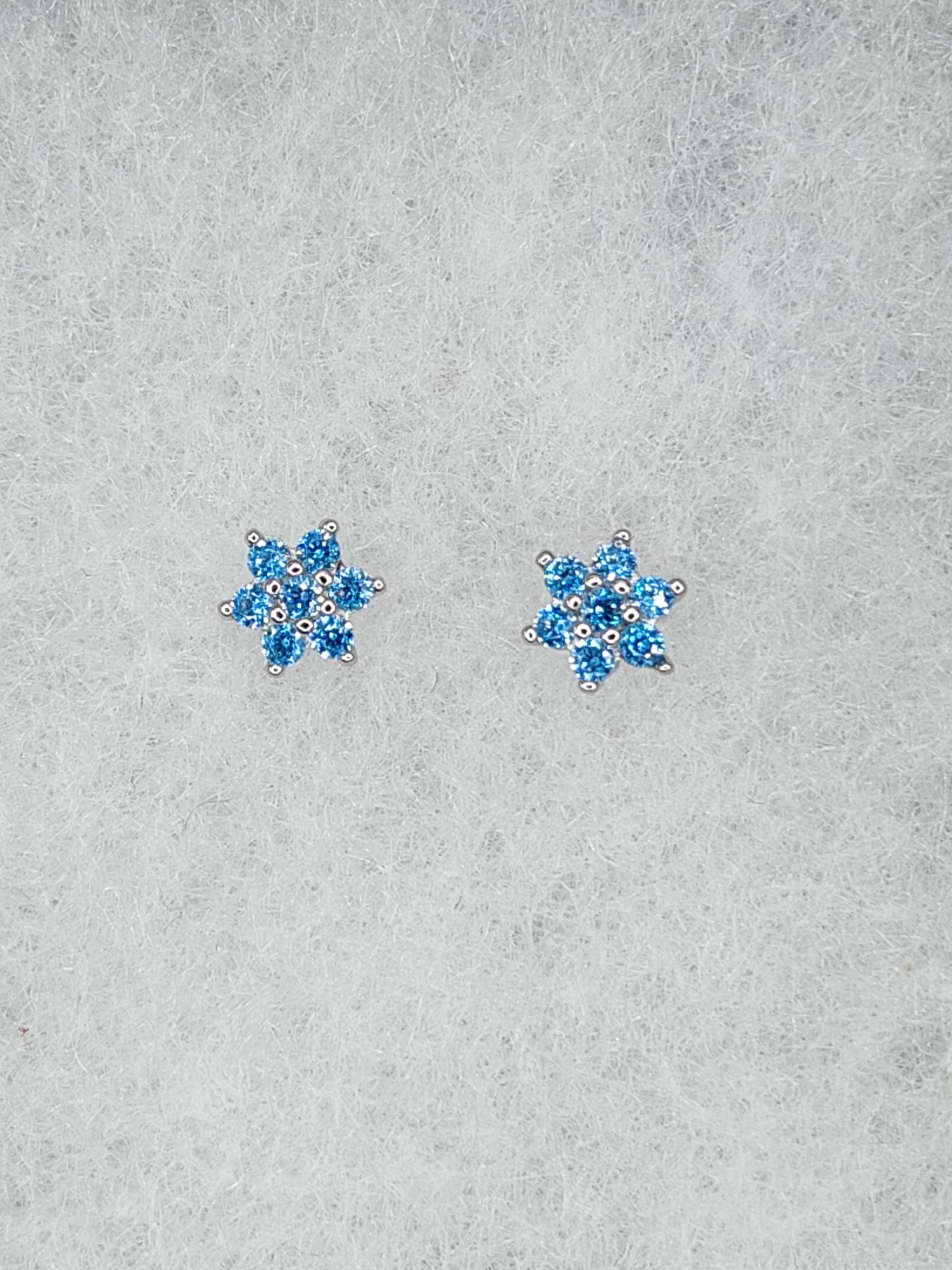 Sterling silver blue cz flower design 5mmx5mm stud earrings