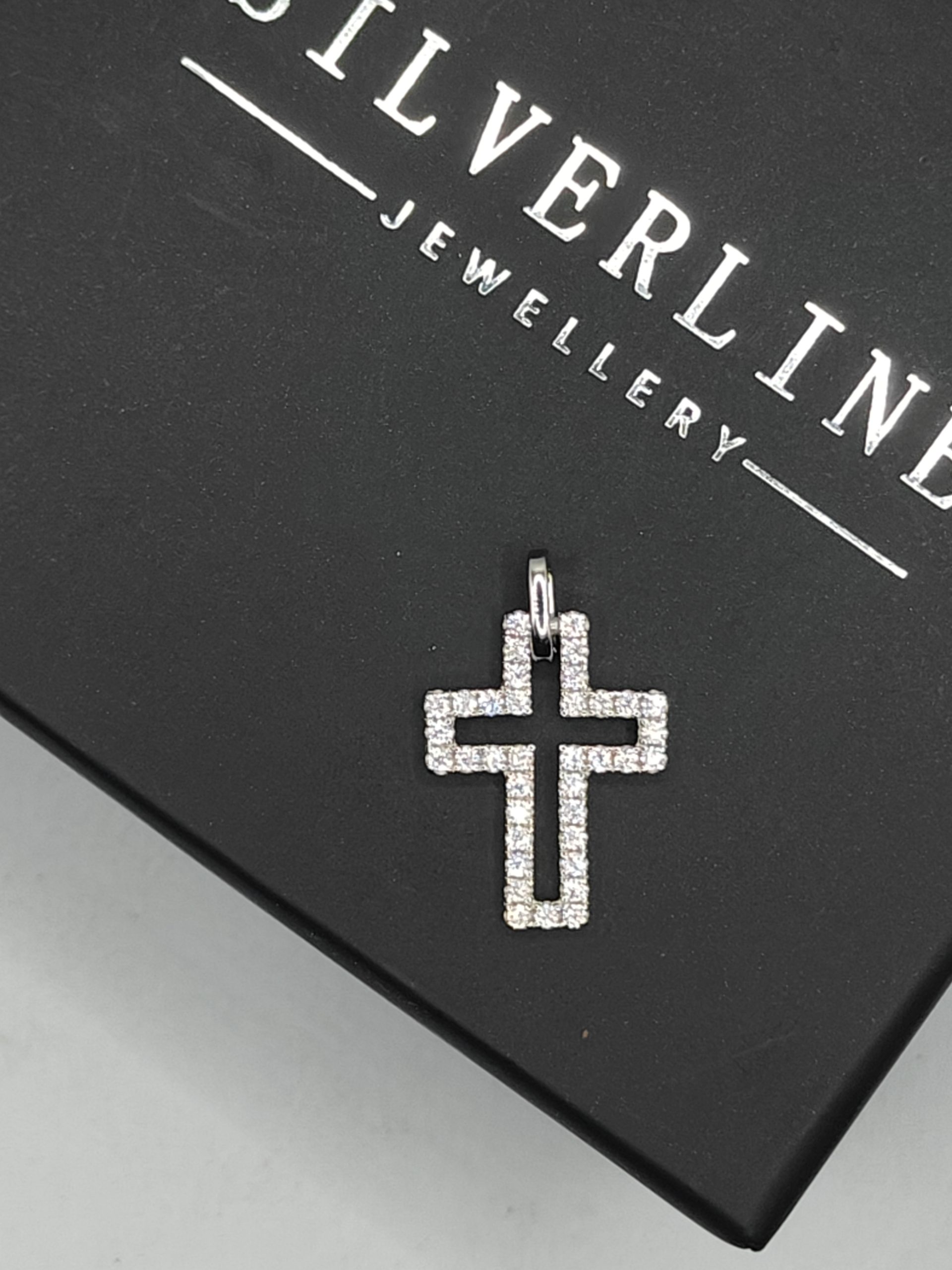 Sterling silver cross with cubic zirconia detail
